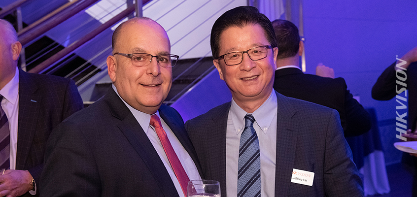 Hikvision North America President Engages with Award Recipient at SIA Honors Night